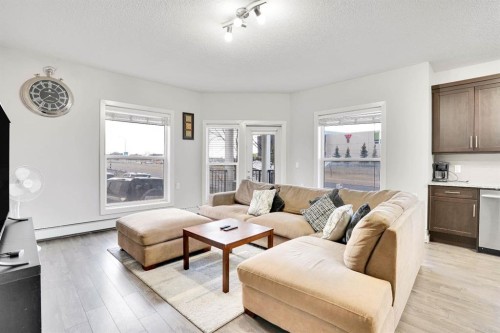 102-3 Taracove Estate Drive Ne, Calgary, AB - Indoor Photo Showing Living Room