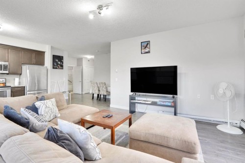 102-3 Taracove Estate Drive Ne, Calgary, AB - Indoor Photo Showing Living Room