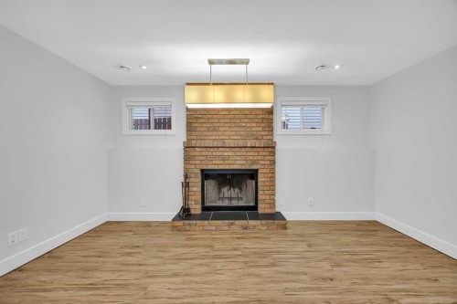 91 Shawglen Way Sw, Calgary, AB - Indoor With Fireplace