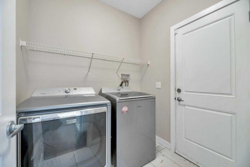 2450 Baysprings Link Sw, Airdrie, AB - Indoor Photo Showing Laundry Room