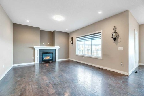 2450 Baysprings Link Sw, Airdrie, AB - Indoor With Fireplace
