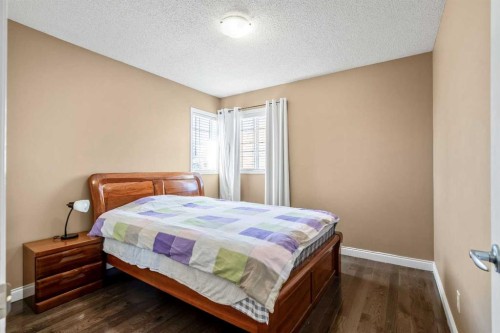 123 Cranwell Close Se, Calgary, AB - Indoor Photo Showing Bedroom