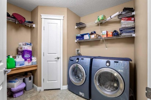 123 Cranwell Close Se, Calgary, AB - Indoor Photo Showing Laundry Room