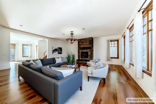 2323 3 Avenue Nw, Calgary, AB - Indoor Photo Showing Living Room With Fireplace