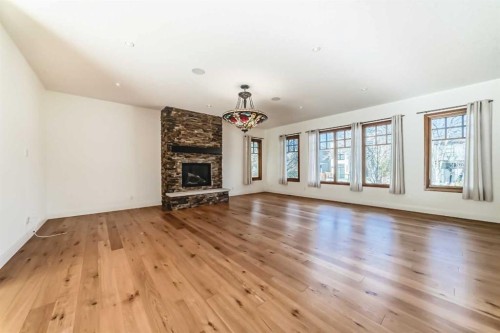 2323 3 Avenue Nw, Calgary, AB - Indoor Photo Showing Other Room With Fireplace