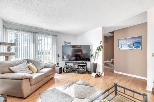 5 Falsby Place Ne, Calgary, AB - Indoor Photo Showing Living Room