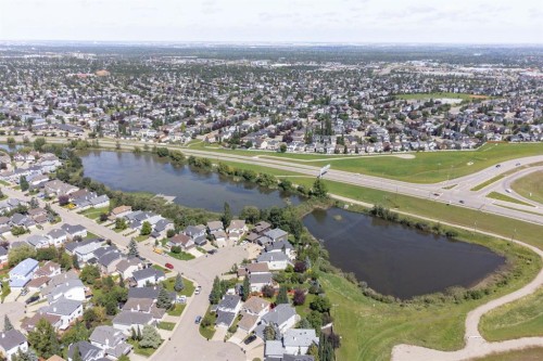 122 Bridlewood Lane Sw, Calgary, AB - Outdoor With Body Of Water With View