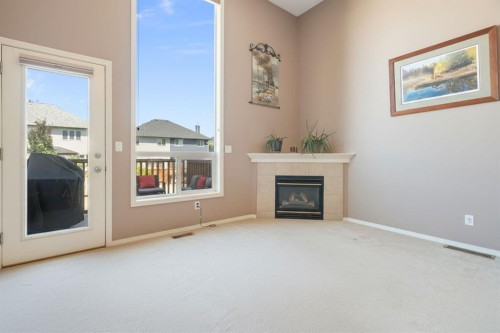 122 Bridlewood Lane Sw, Calgary, AB - Indoor With Fireplace
