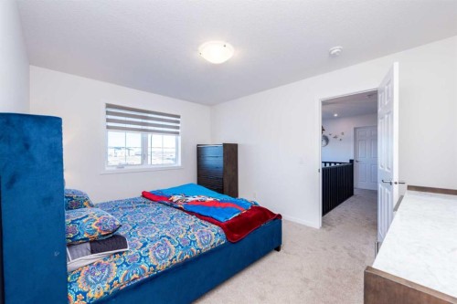 7 Cityline Heath Ne, Calgary, AB - Indoor Photo Showing Bedroom