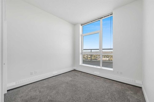 2404-77 Spruce Place Sw, Calgary, AB - Indoor Photo Showing Other Room