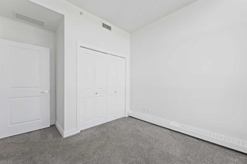 2404-77 Spruce Place Sw, Calgary, AB - Indoor Photo Showing Other Room