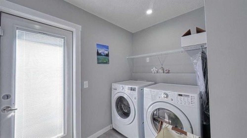 635 Taradale Drive Ne, Calgary, AB - Indoor Photo Showing Laundry Room