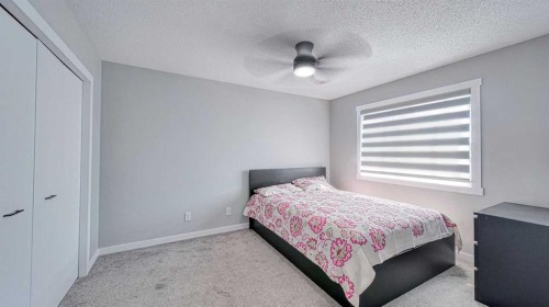 635 Taradale Drive Ne, Calgary, AB - Indoor Photo Showing Bedroom