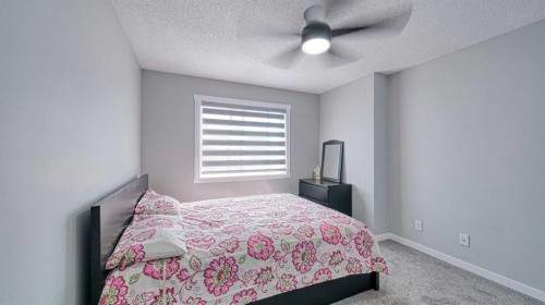 635 Taradale Drive Ne, Calgary, AB - Indoor Photo Showing Bedroom