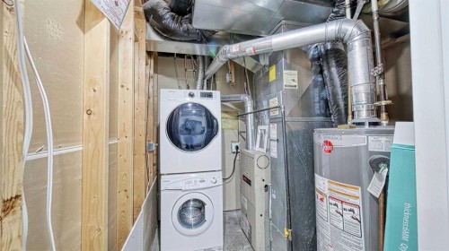 635 Taradale Drive Ne, Calgary, AB - Indoor Photo Showing Laundry Room