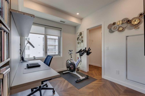 501-8505 Broadcast Avenue Sw, Calgary, AB - Indoor Photo Showing Gym Room