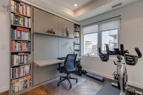 501-8505 Broadcast Avenue Sw, Calgary, AB - Indoor Photo Showing Gym Room