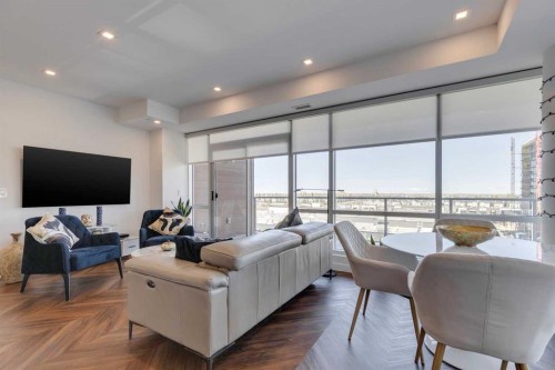 501-8505 Broadcast Avenue Sw, Calgary, AB - Indoor Photo Showing Living Room