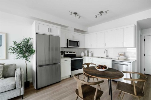 1316-14910 1 Street Nw, Calgary, AB - Indoor Photo Showing Kitchen