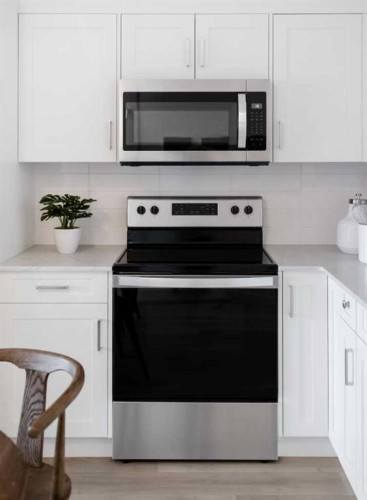 1316-14910 1 Street Nw, Calgary, AB - Indoor Photo Showing Kitchen With Upgraded Kitchen