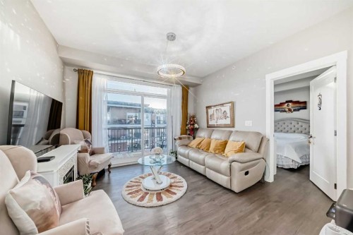 405-10 Walgrove Walk Se, Calgary, AB - Indoor Photo Showing Living Room