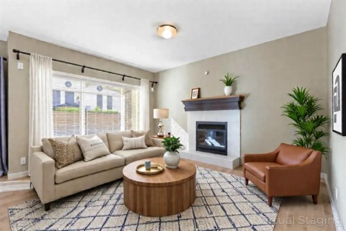 328 Silverado Plains Circle Sw, Calgary, AB - Indoor Photo Showing Living Room With Fireplace