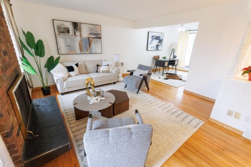 56 Lynndale Crescent Se, Calgary, AB - Indoor Photo Showing Living Room