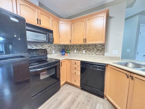 116-369 Rocky Vista Park Nw, Calgary, AB - Indoor Photo Showing Kitchen