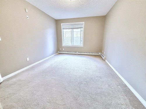 116-369 Rocky Vista Park Nw, Calgary, AB - Indoor Photo Showing Other Room