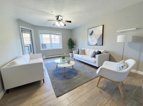 116-369 Rocky Vista Park Nw, Calgary, AB - Indoor Photo Showing Living Room
