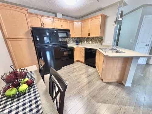 116-369 Rocky Vista Park Nw, Calgary, AB - Indoor Photo Showing Kitchen