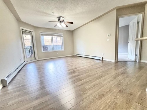 116-369 Rocky Vista Park Nw, Calgary, AB - Indoor Photo Showing Other Room