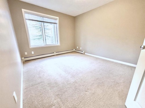 116-369 Rocky Vista Park Nw, Calgary, AB - Indoor Photo Showing Other Room