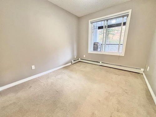 116-369 Rocky Vista Park Nw, Calgary, AB - Indoor Photo Showing Other Room