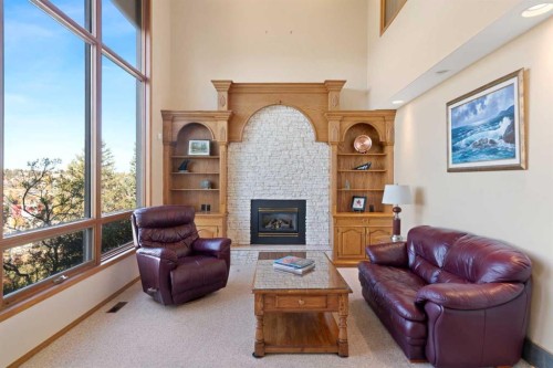 79 Edenstone View Nw, Calgary, AB - Indoor Photo Showing Living Room With Fireplace