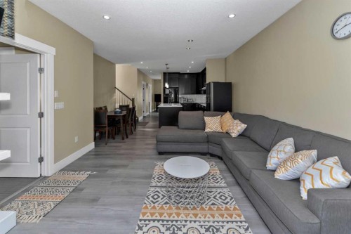 7432 Ogden Road Se, Calgary, AB - Indoor Photo Showing Living Room