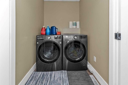 7432 Ogden Road Se, Calgary, AB - Indoor Photo Showing Laundry Room