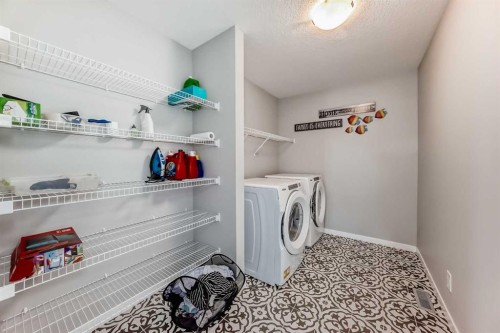 113 Howse Mount Ne, Calgary, AB - Indoor Photo Showing Laundry Room