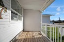 2-717 Centre Street, Vulcan, AB  - Outdoor With Deck Patio Veranda With Exterior 