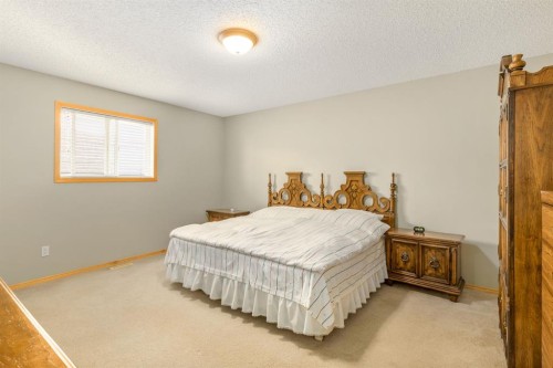131 Panatella Close Nw, Calgary, AB - Indoor Photo Showing Bedroom