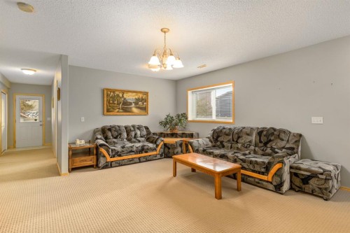 131 Panatella Close Nw, Calgary, AB - Indoor Photo Showing Living Room