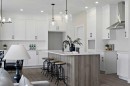 634 Bayview Lane Sw, Airdrie, AB  - Indoor Photo Showing Kitchen With Upgraded Kitchen 