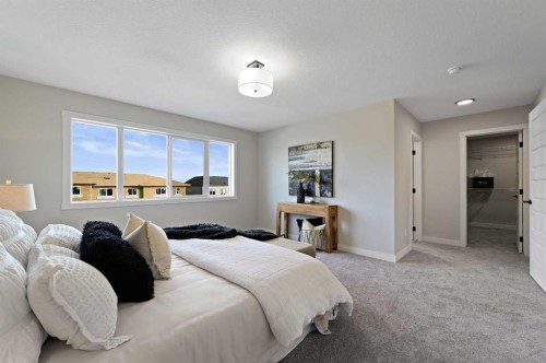 634 Bayview Lane Sw, Airdrie, AB - Indoor Photo Showing Bedroom