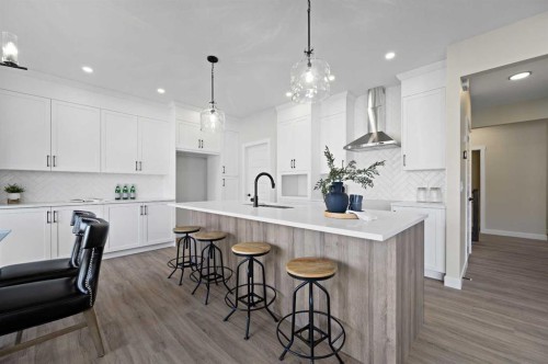 634 Bayview Lane Sw, Airdrie, AB - Indoor Photo Showing Kitchen With Upgraded Kitchen