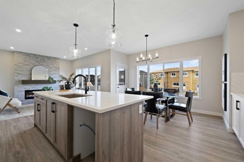 634 Bayview Lane Sw, Airdrie, AB - Indoor Photo Showing Kitchen With Upgraded Kitchen