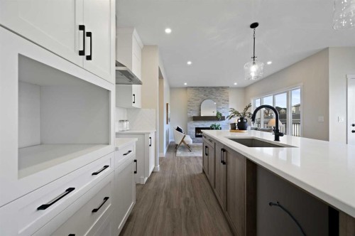 634 Bayview Lane Sw, Airdrie, AB - Indoor Photo Showing Kitchen With Upgraded Kitchen