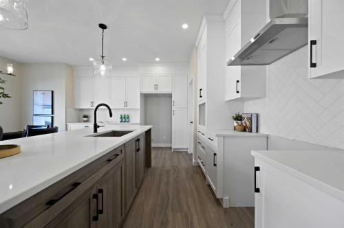 634 Bayview Lane Sw, Airdrie, AB - Indoor Photo Showing Kitchen With Upgraded Kitchen
