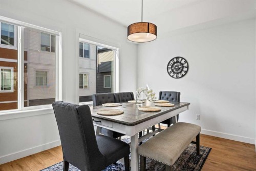 602-335 Creekside Boulevard Sw, Calgary, AB - Indoor Photo Showing Dining Room
