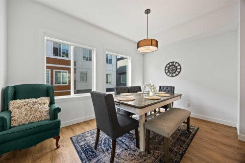 602-335 Creekside Boulevard Sw, Calgary, AB - Indoor Photo Showing Dining Room