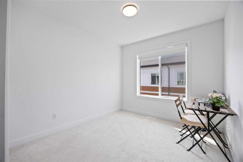 602-335 Creekside Boulevard Sw, Calgary, AB - Indoor Photo Showing Other Room